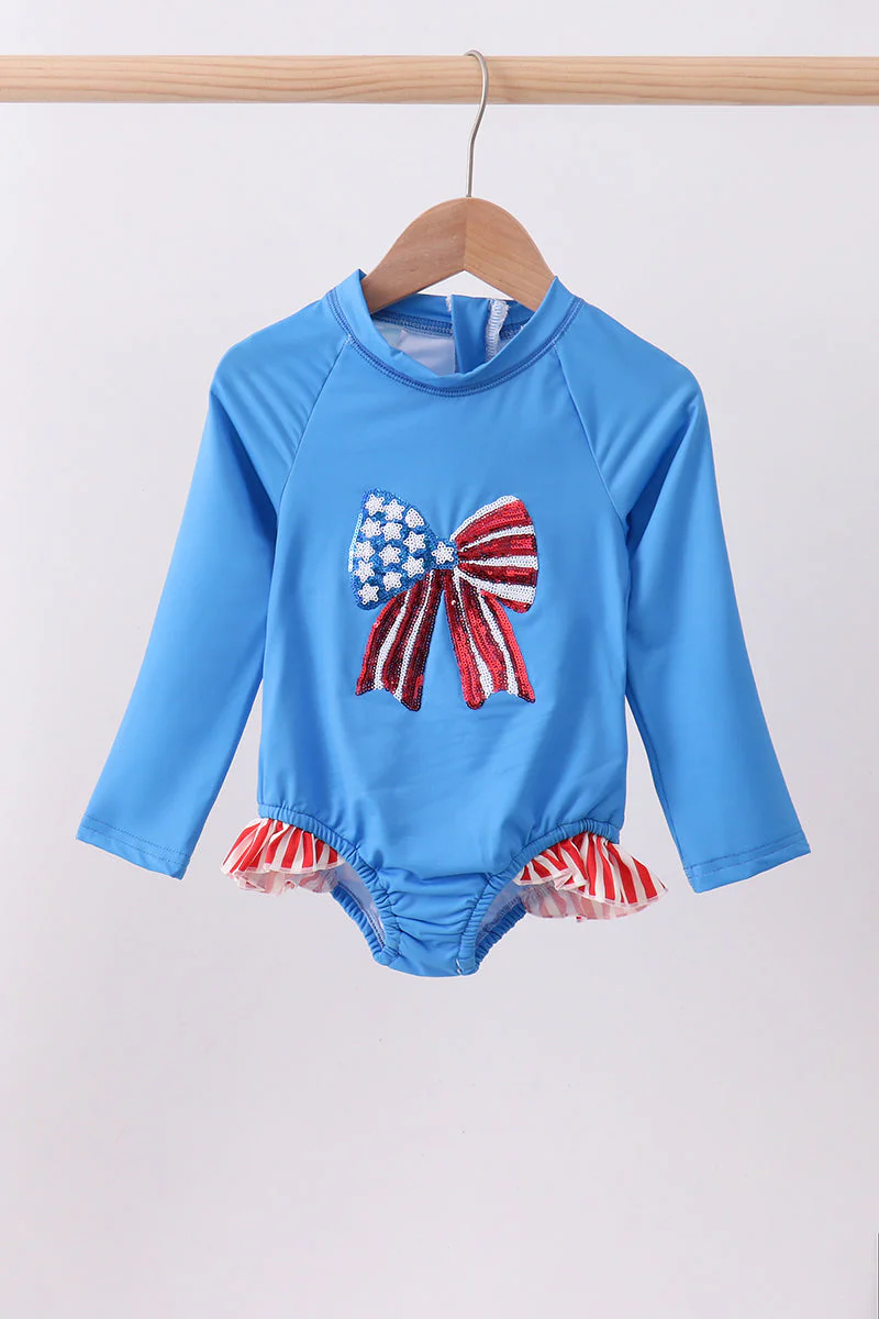 Blue bow sequin rashguard