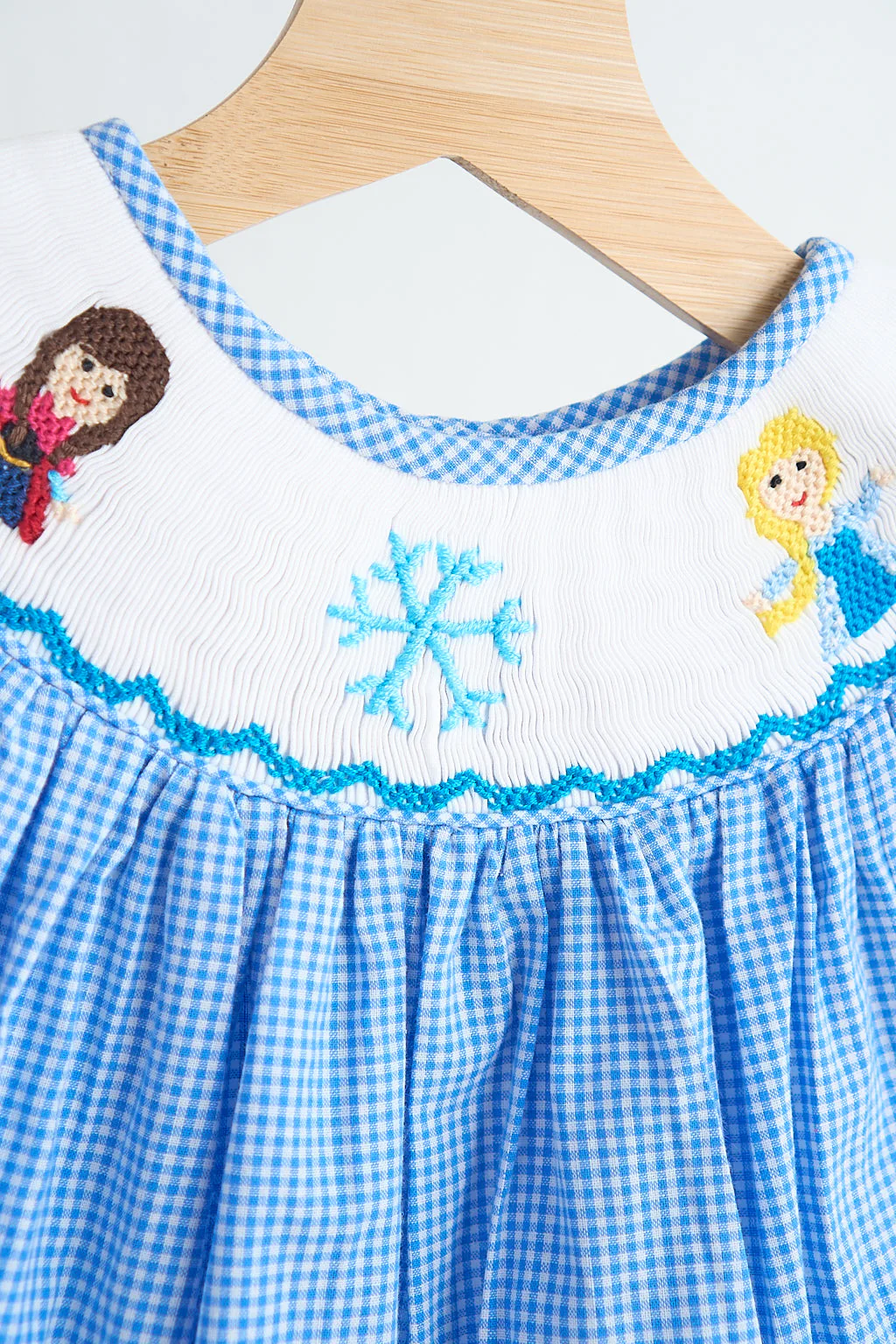 Blue snow princess hand smocked gingham girl romper - Image 3