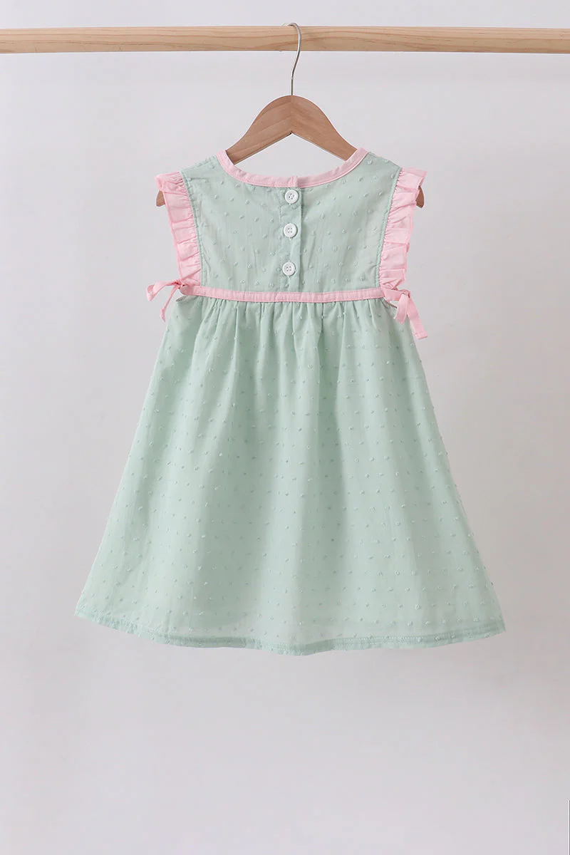 Green swiss dot cross sheep ruffle dress - Image 2