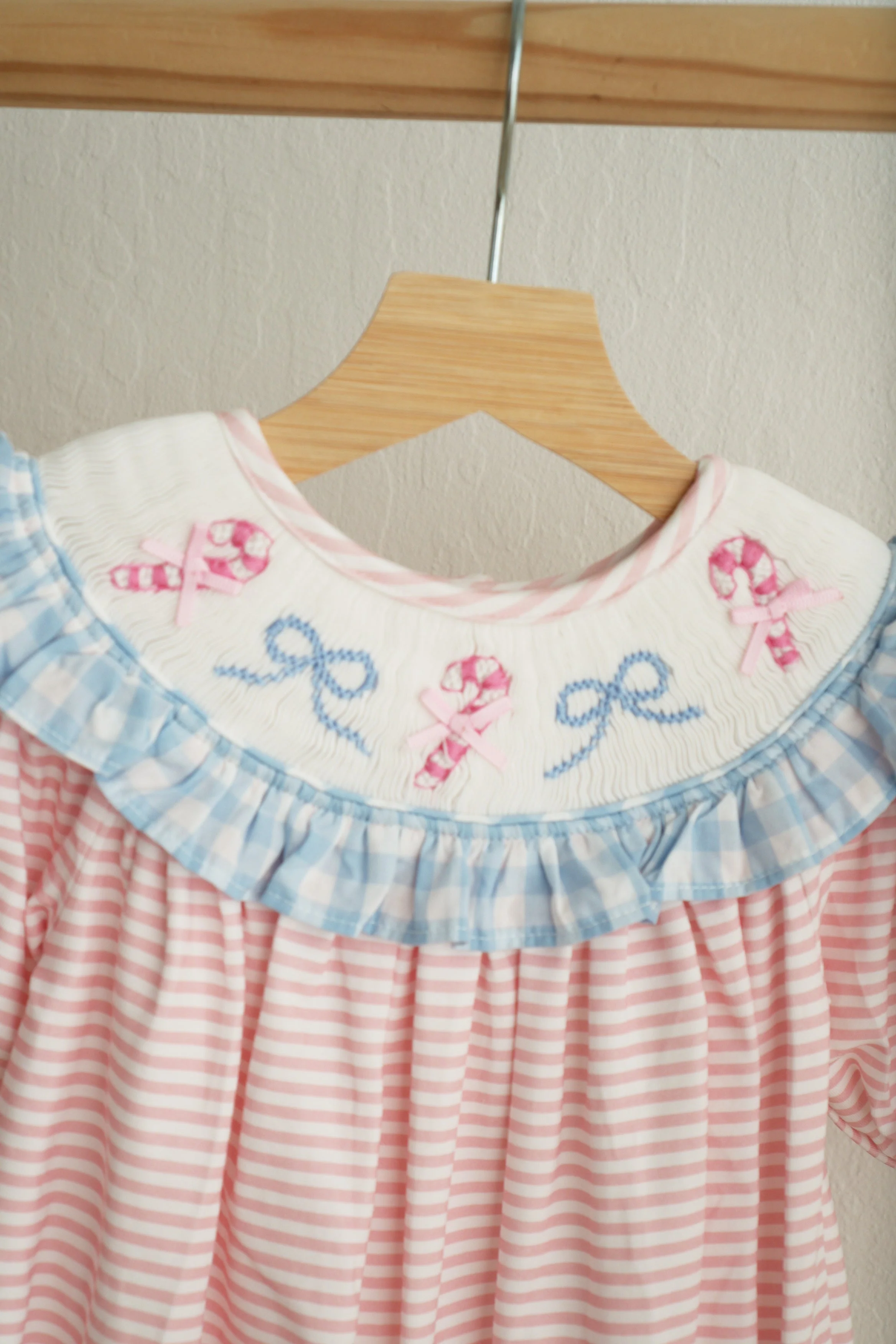 Pink candy cane bow hand smocked ruffle romper - Image 2