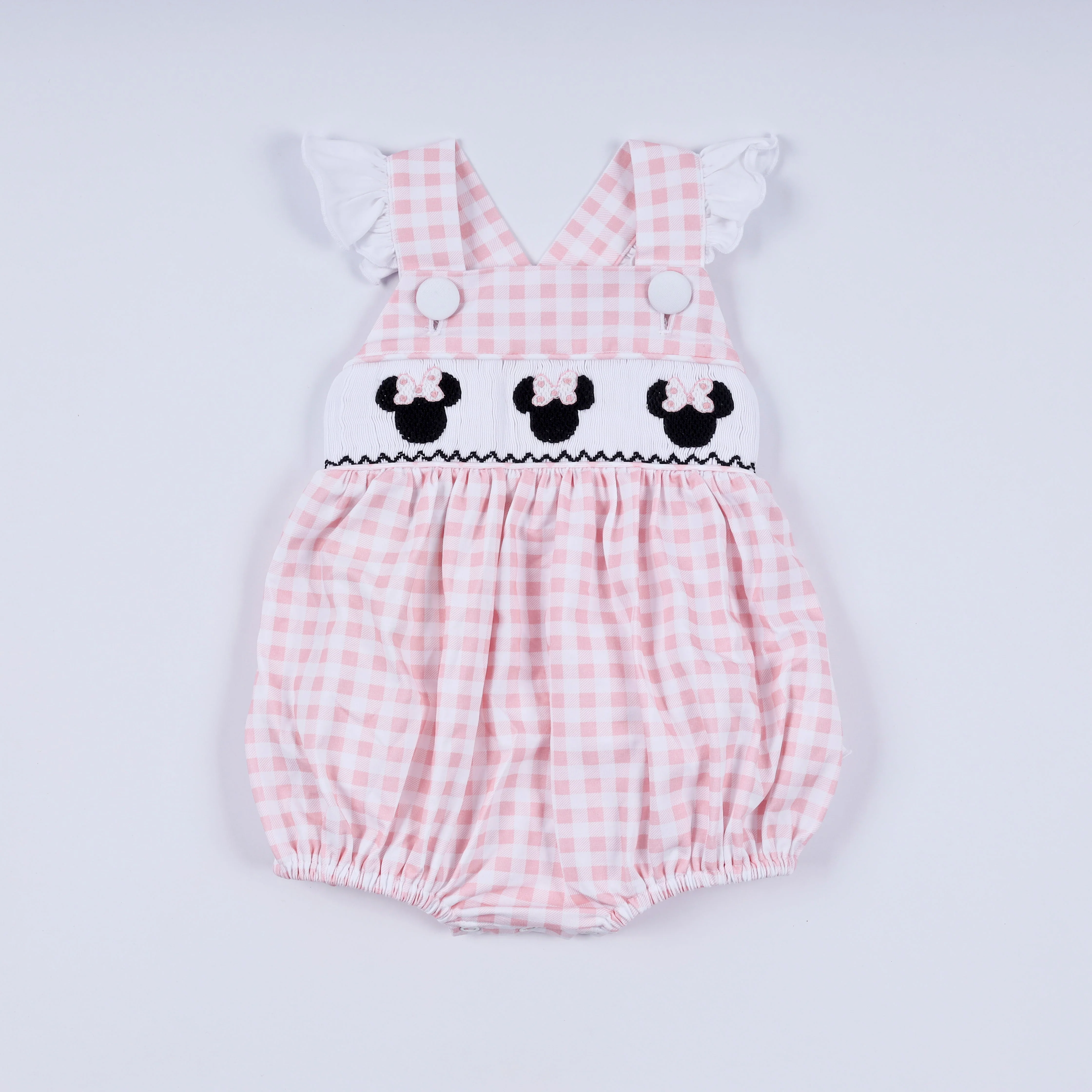 Pink character hand smocked gingham ruffle bubble